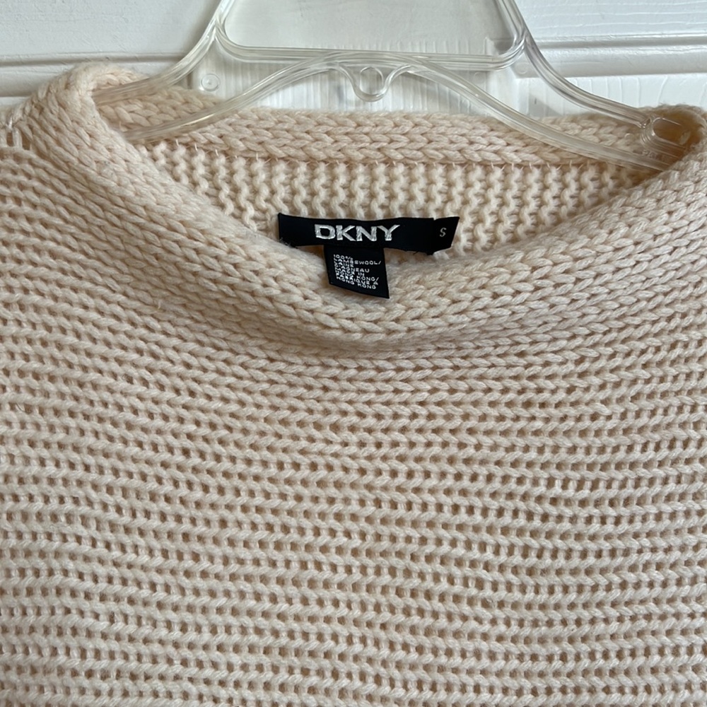 DKNY sweater may fit medium